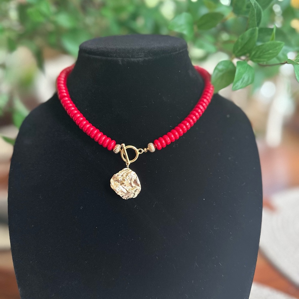 Elegant Red Beaded Necklace with Gold Toggle closure and Pendant